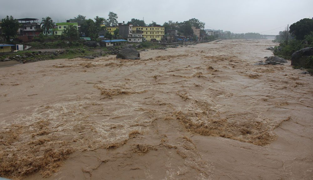तिनाउ नदीमा बाढीको जोखिम : तटीय क्षेत्रमा उच्च सतर्कता अपनाउन आग्रह