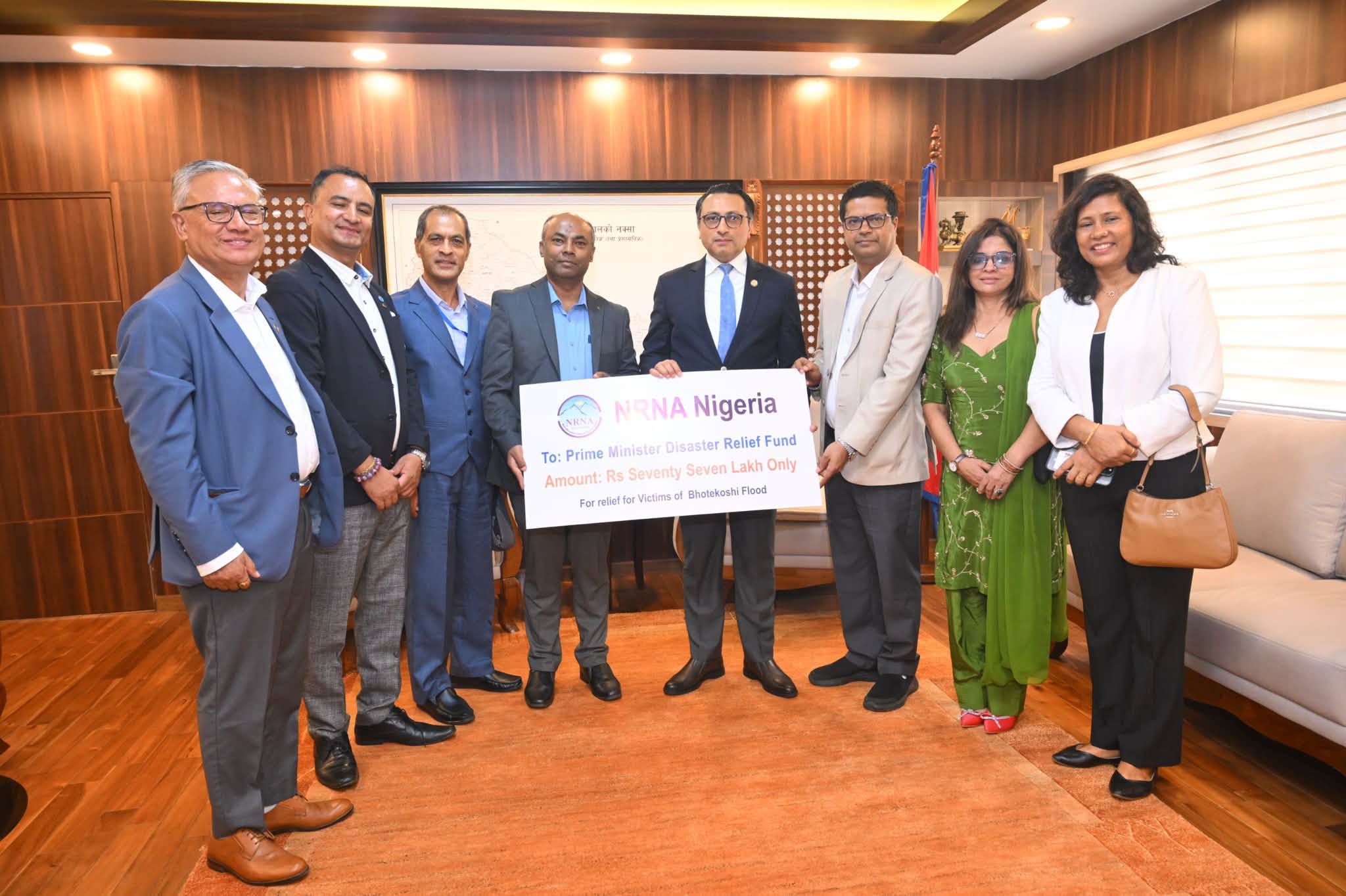 भोटेकोशी बाडिपिडितको पुनर्स्थापनाको लागी एनआरएन नाइजेरिया र एनआरएन घानाको तर्फबाट रु ८० लाख बराबरको चेक हस्तानतरण